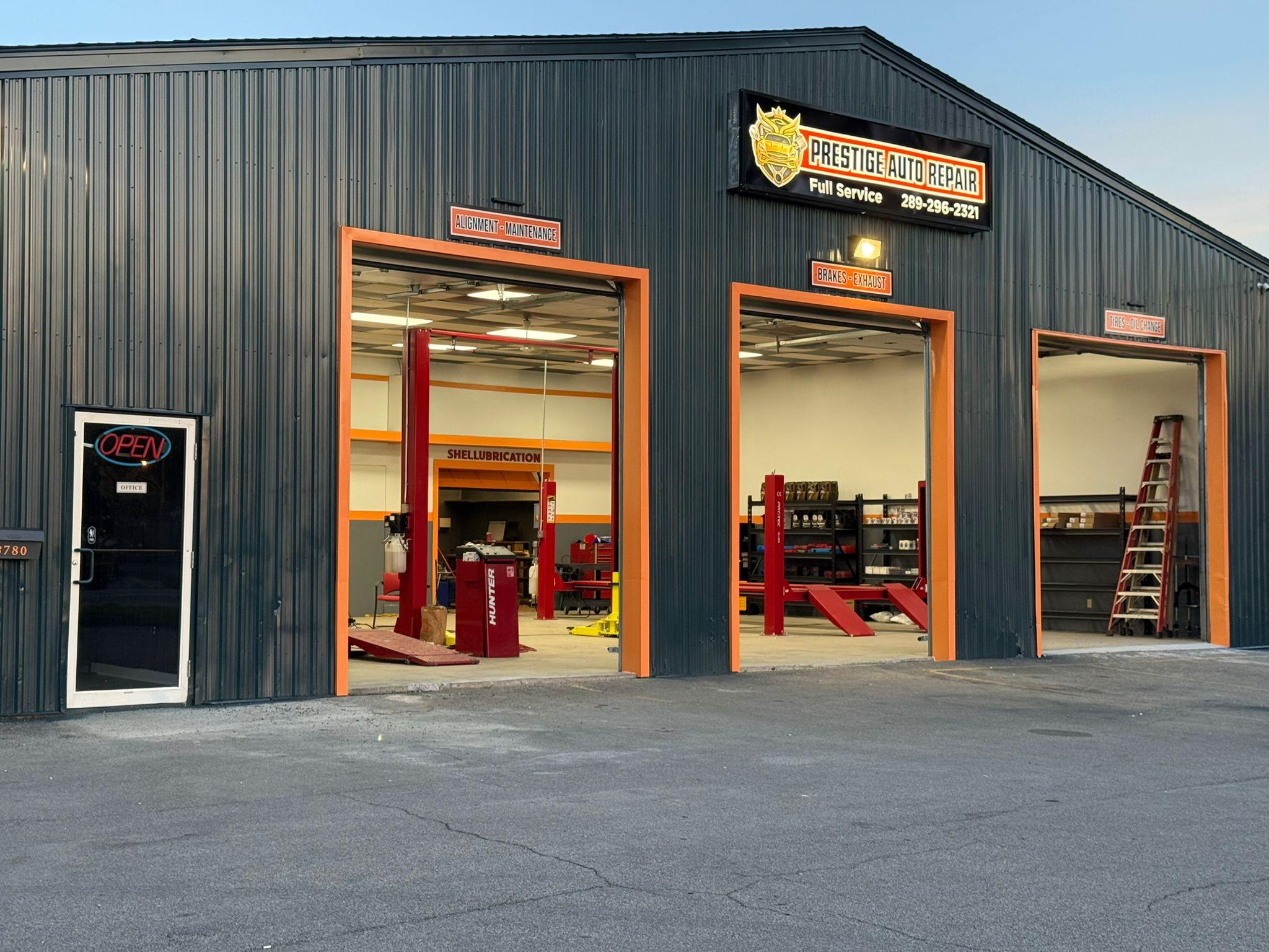 Prestige Auto Repair shop with open service bays in Niagara Falls